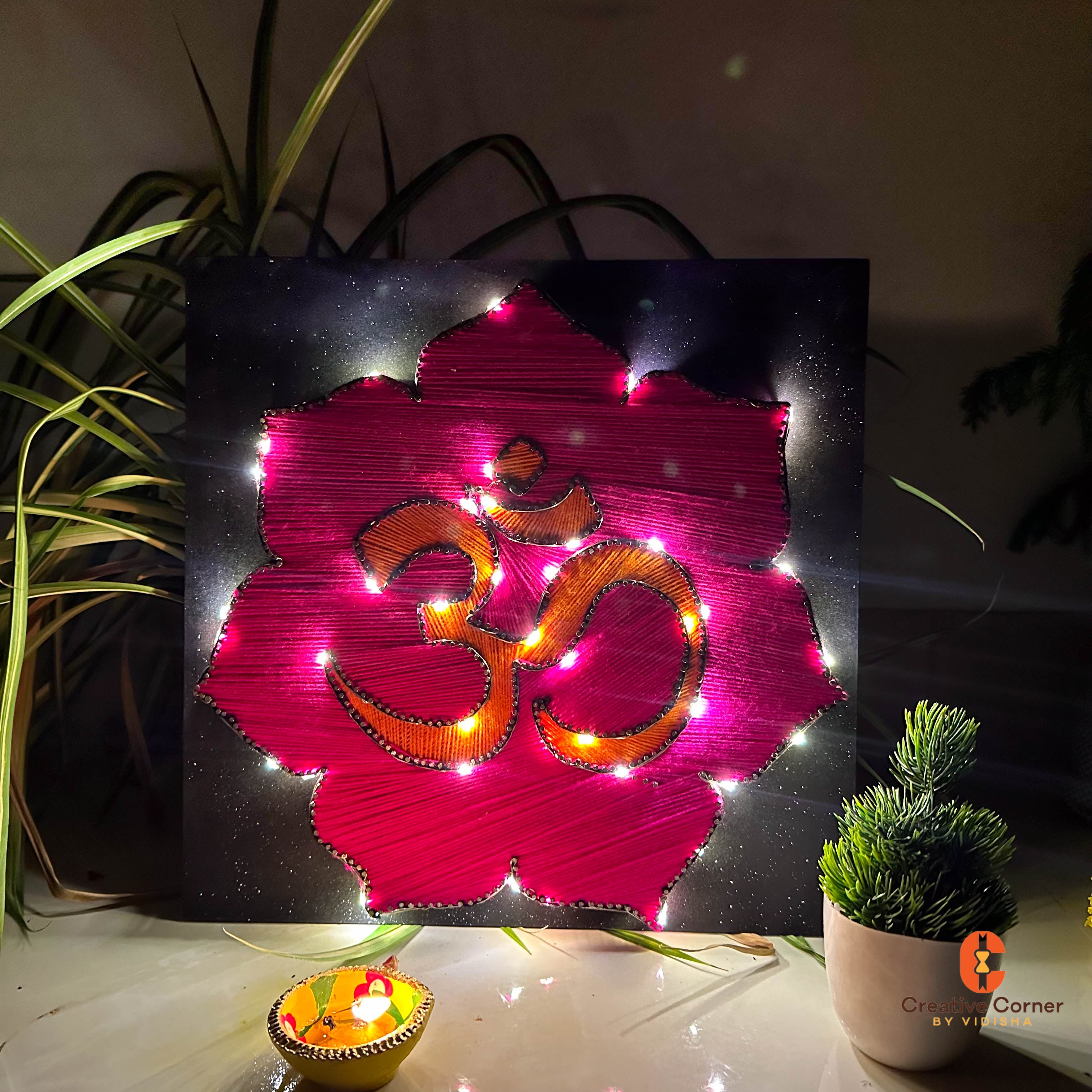 Om festive decor with lights